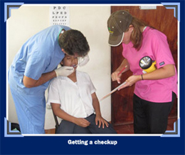 deFabrique Orthodontics Hogar Maria getting a checkup