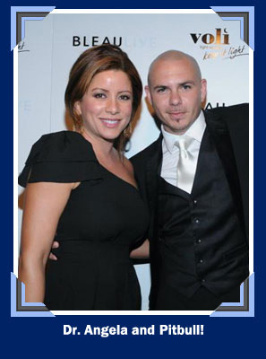 Dr. Angela deFabrique and Dr. Nicolas deFabrique with Pitbull